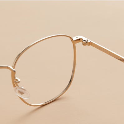 hinge of a metal glasses frame